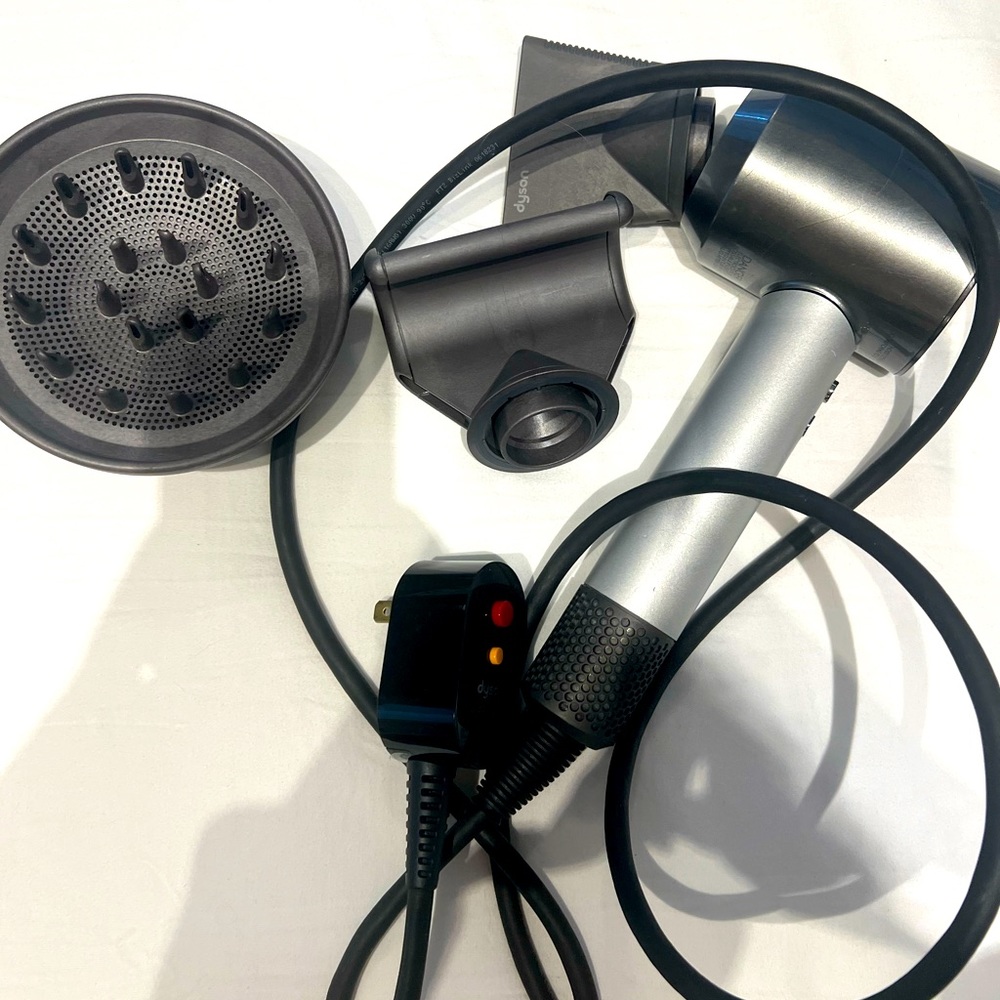 The Dyson Supersonic™ hair dryer with 2 styling tools